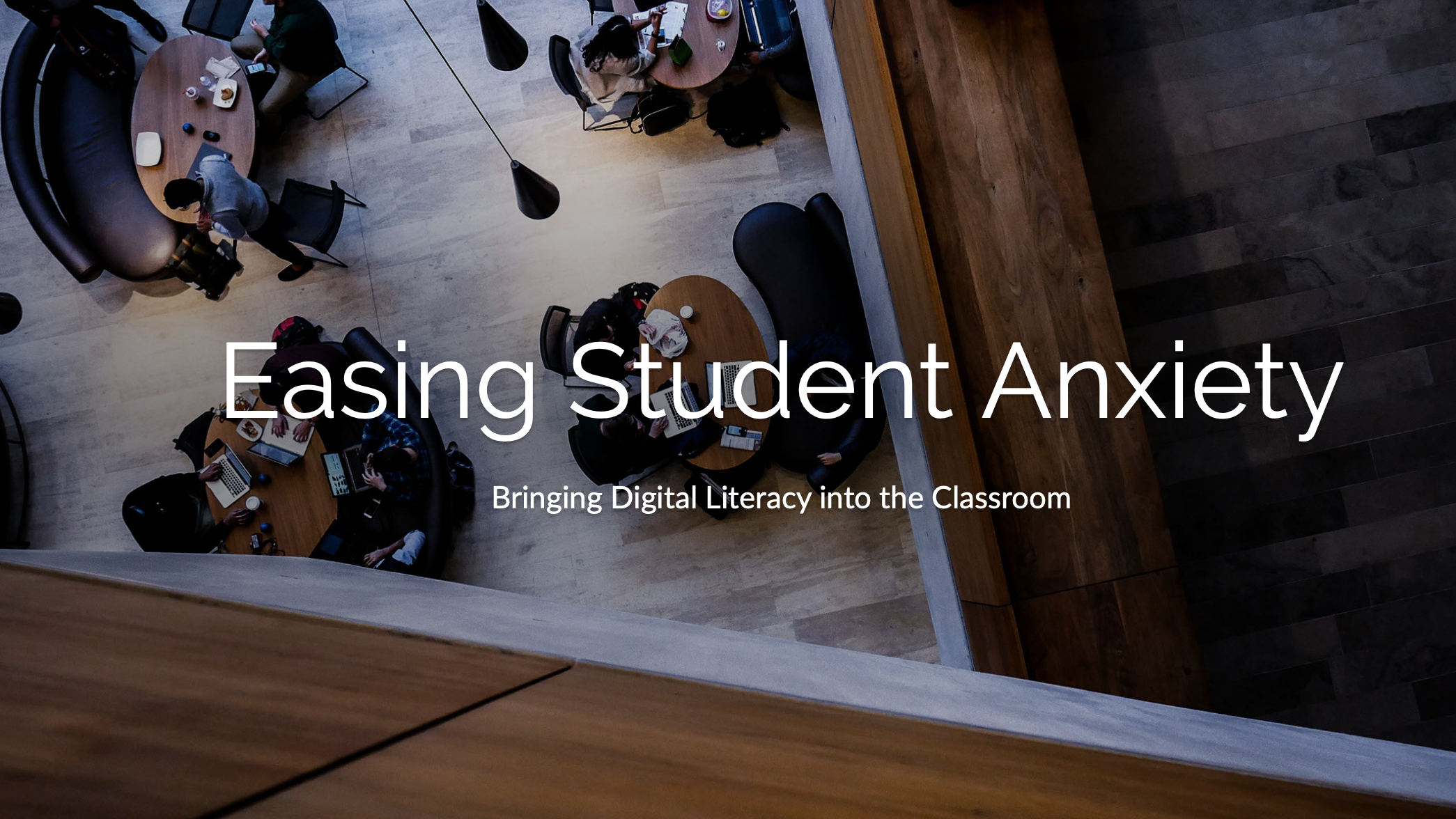 Overhead image of a campus student work area with a large title in the center, "Easing Student Anxiety" and a subtitle "Bringing Digital Literacy into the Classroom."